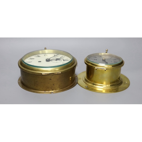 266 - Two brass bulkhead timepieces