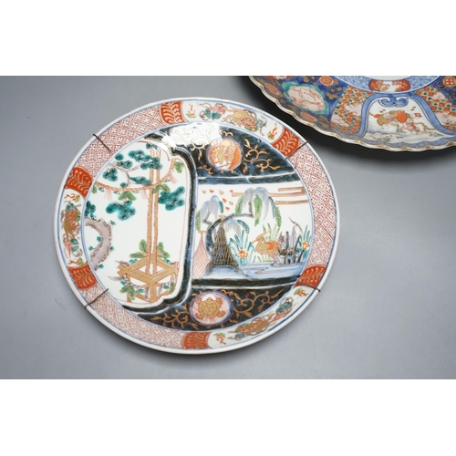 271 - Two Japanese Imari wall plates, Meiji period - largest 35cm diameter