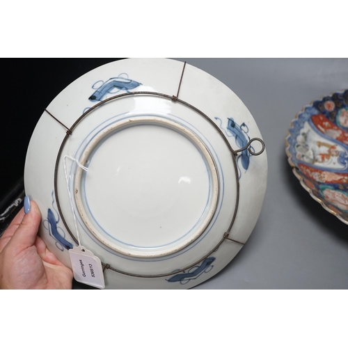 271 - Two Japanese Imari wall plates, Meiji period - largest 35cm diameter