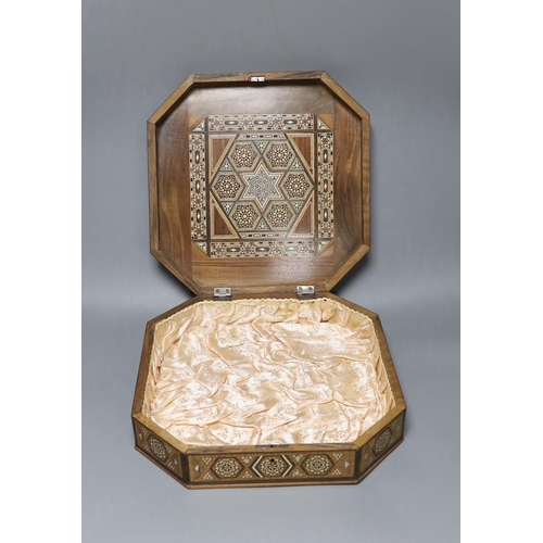 286 - A Moroccan inlaid bone and mother of pearl hexagonal casket, 33 x 33cm