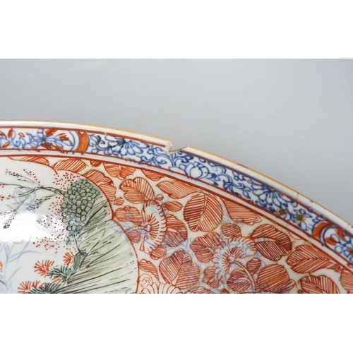 287 - A large Chinese Kangxi dish, clobbered decoration, 37cms diameter.