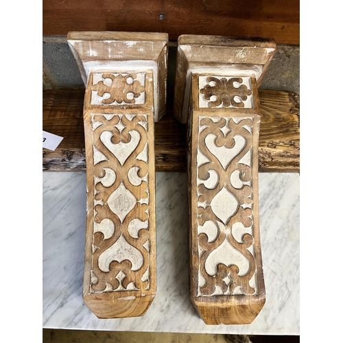 3 - A pine and painted hardwood wall bracket, length 116cm, depth 22cm, height 42cm