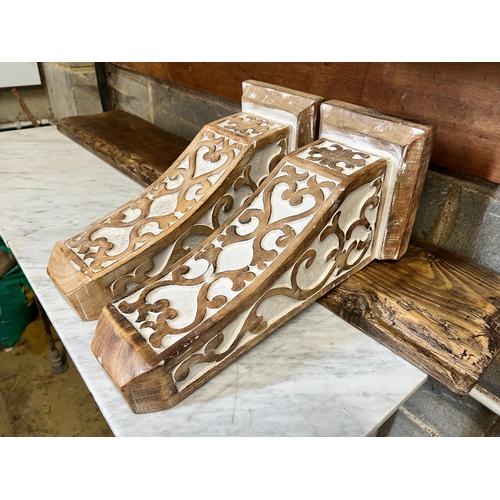 3 - A pine and painted hardwood wall bracket, length 116cm, depth 22cm, height 42cm