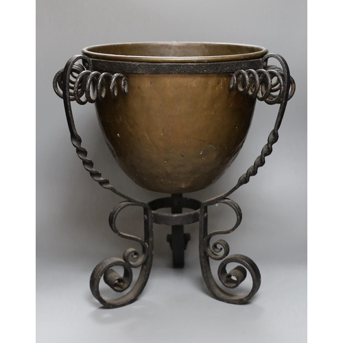 311 - A Spanish copper and wrought iron jardinière, 45cm