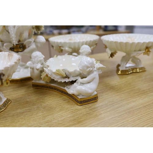 312 - Six pieces of Moore Bros. white glazed gilt edged porcelain, including a set of four comport, 20cm t... 