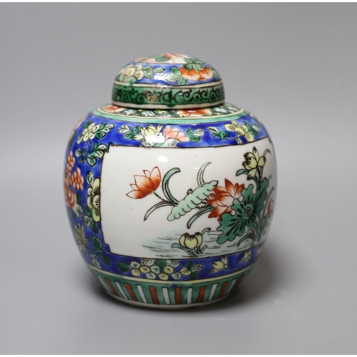 335 - A Chinese ginger jar and cover, two tea bowls and a miniature teapot, tallest 16cm