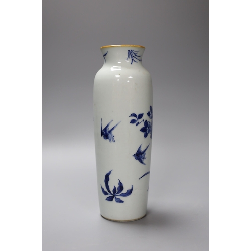 353 - A Chinese blue and white vase decorated with flowers and birds, 21.5cm