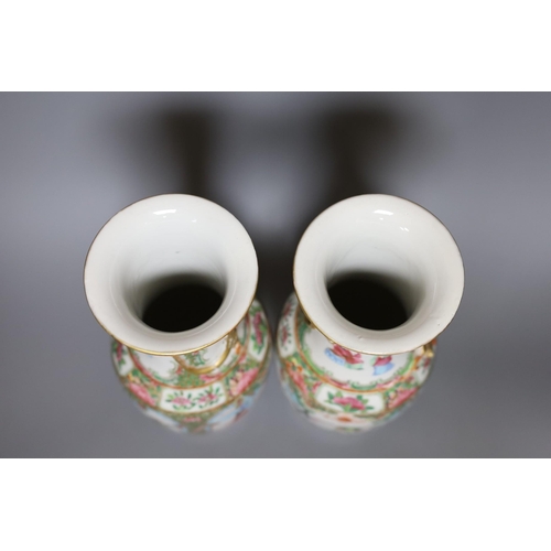 363 - A pair of 19th century Chinese Canton ceramic vases, 25.5cm tall