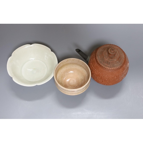 376 - A Chinese Yixing teapot, 12cm tall, and two other Chinese ceramic bowls