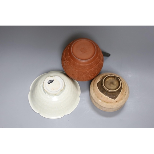 376 - A Chinese Yixing teapot, 12cm tall, and two other Chinese ceramic bowls