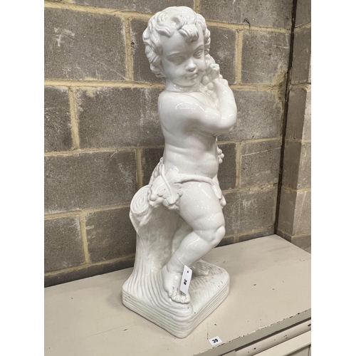 38 - A glazed earthenware cherub ornament, height 87cm