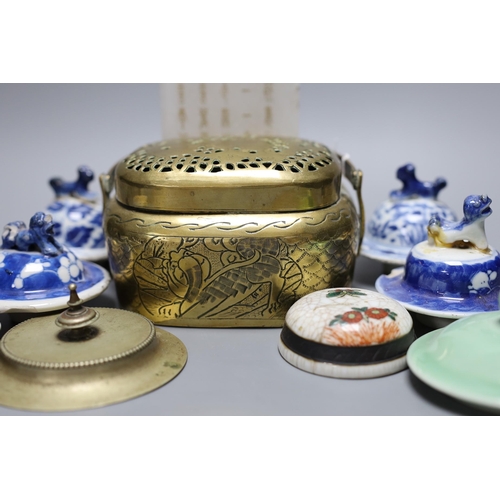 393 - A collection of various Chinese porcelain lids/covers, a clobbered blue and white tea bowl, a brass ... 