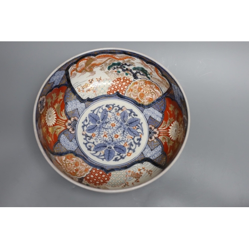 397 - An 18th century Japanese Imari dish (af), another Imari dish, an 18th century Chinese export bowl (a... 