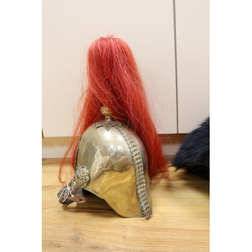 402 - A Royal Horseguard's helmet and Queens guard bearskin