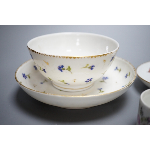 425 - A rare Nyon porcelain slop bowl and saucer, a Meissen saucer and cylindrical pot and a pair of Germa... 