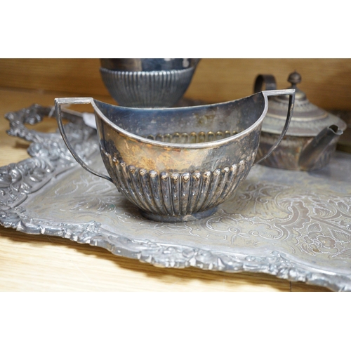 447 - A silver plated two handled tea tray and seven other plated items, tray length 80cm