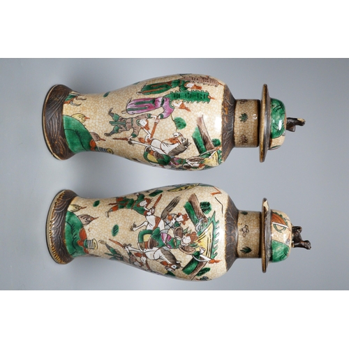 451 - A pair of Chinese crackleware lidded vases, 30cm