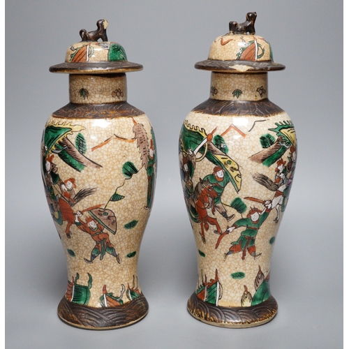 451 - A pair of Chinese crackleware lidded vases, 30cm