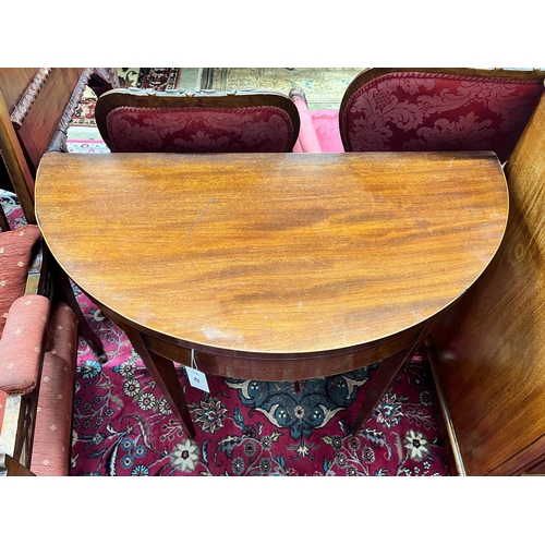 47 - A George III mahogany D-shaped folding tea table, width 92cm, depth 46cm, height 73cm