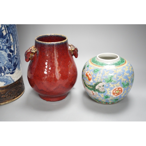 473 - A large Chinese blue and white crackle glaze vase, a sang de boeuf vase and a monochrome jar, talles... 