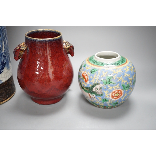 473 - A large Chinese blue and white crackle glaze vase, a sang de boeuf vase and a monochrome jar, talles... 