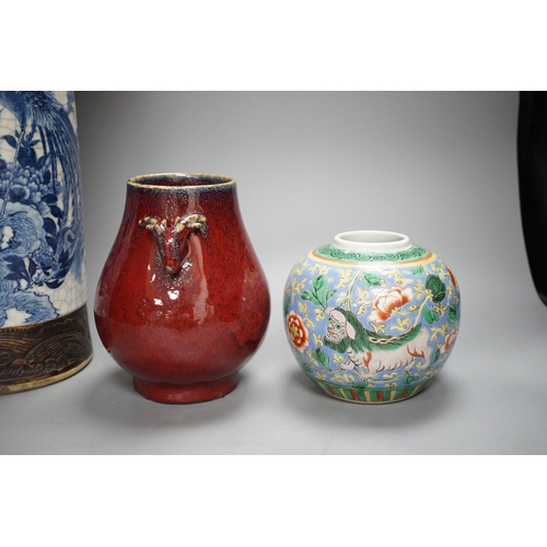 473 - A large Chinese blue and white crackle glaze vase, a sang de boeuf vase and a monochrome jar, talles... 