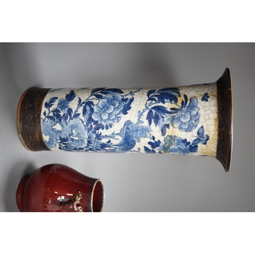 473 - A large Chinese blue and white crackle glaze vase, a sang de boeuf vase and a monochrome jar, talles... 