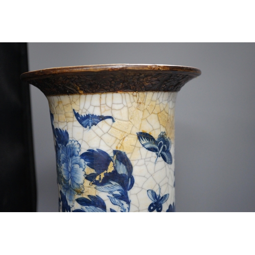 473 - A large Chinese blue and white crackle glaze vase, a sang de boeuf vase and a monochrome jar, talles... 