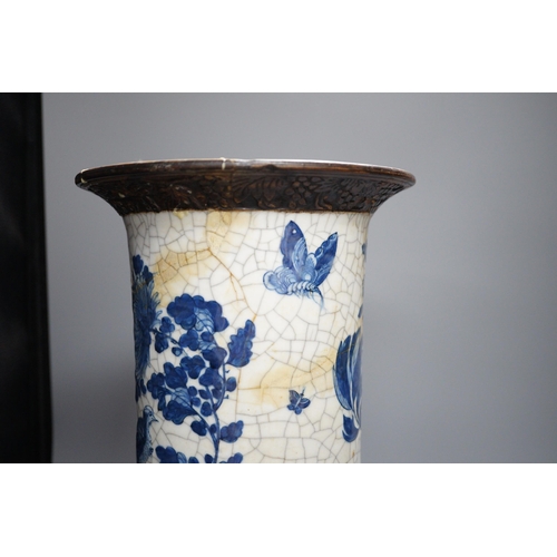 473 - A large Chinese blue and white crackle glaze vase, a sang de boeuf vase and a monochrome jar, talles... 