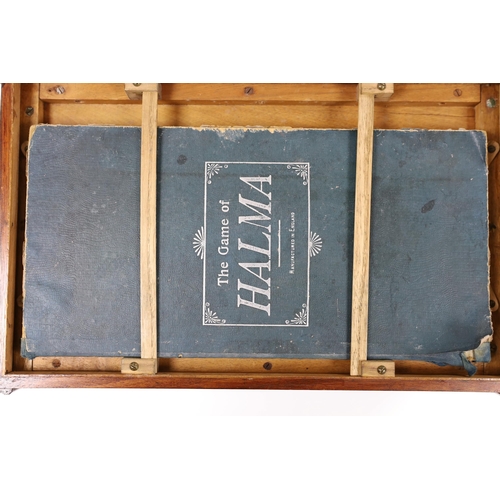 474 - A games compendium in wooden case, 13cm tall