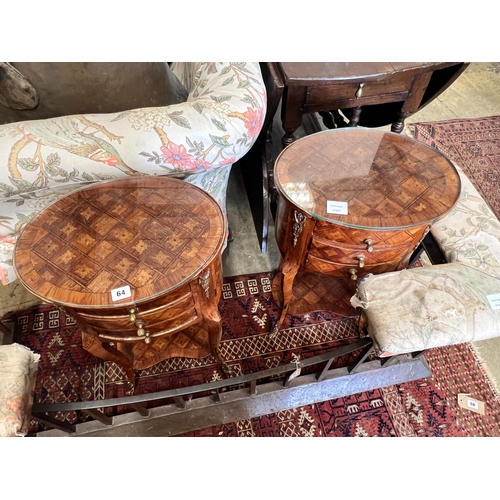 64 - A pair of French transitional style oval parquetry inlaid bedside cupboards, kidney shaped under tie... 