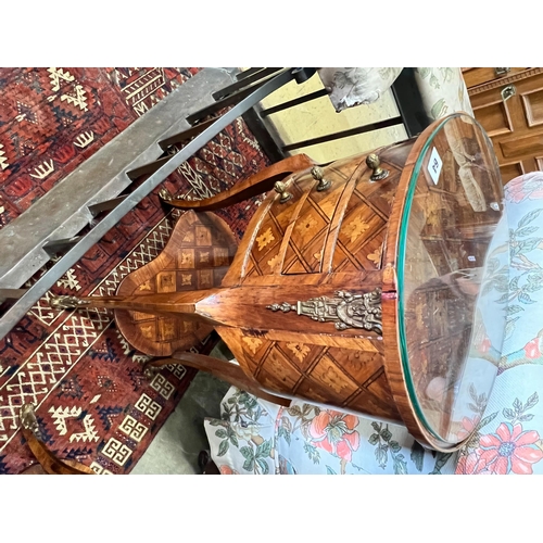 64 - A pair of French transitional style oval parquetry inlaid bedside cupboards, kidney shaped under tie... 