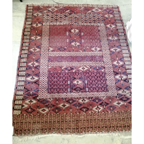 66 - A Tekke red ground rug, 168 x 132cm