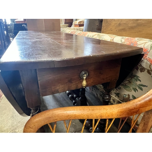 68 - An early 18th century style oak oval topped gateleg dining table, (one leaf in need of repair), leng... 