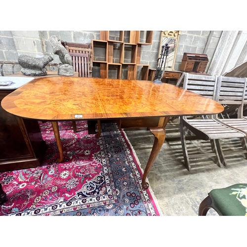 92 - A Queen Anne Walnut revival burr walnut pad foot drop leaf dining table, extended 144cm width 99cm h... 