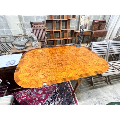 92 - A Queen Anne Walnut revival burr walnut pad foot drop leaf dining table, extended 144cm width 99cm h... 