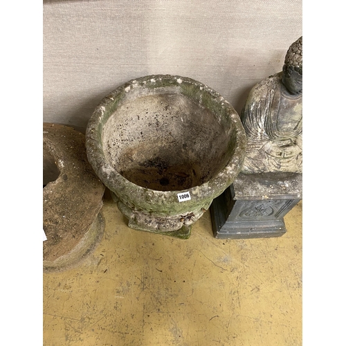 1006 - A circular reconstituted stone garden planter, diameter 47cm, height 60cm