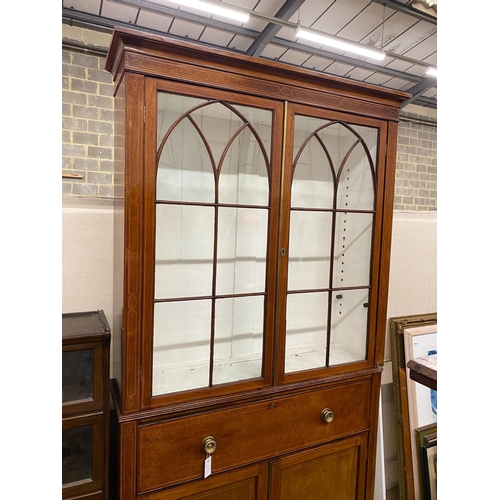 1013 - A George III mahogany secretaire bookcase, length 122cm, depth 33cm, height 232cm