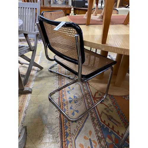 1034 - Six caned ebonized cantilever dining chairs in the style of Knoll Cesca by Marcel Breuer