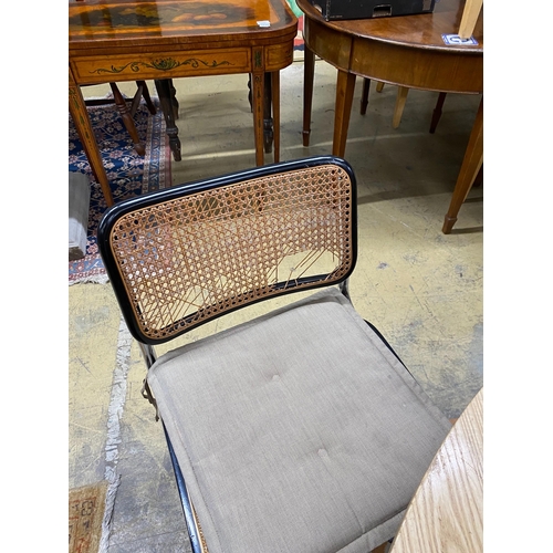 1034 - Six caned ebonized cantilever dining chairs in the style of Knoll Cesca by Marcel Breuer