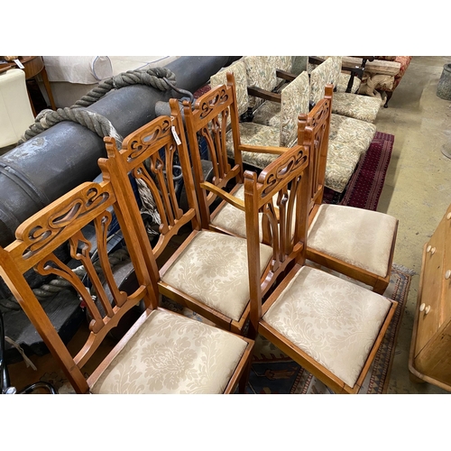 1036 - Five Art Nouveau walnut dining chairs, one with arms