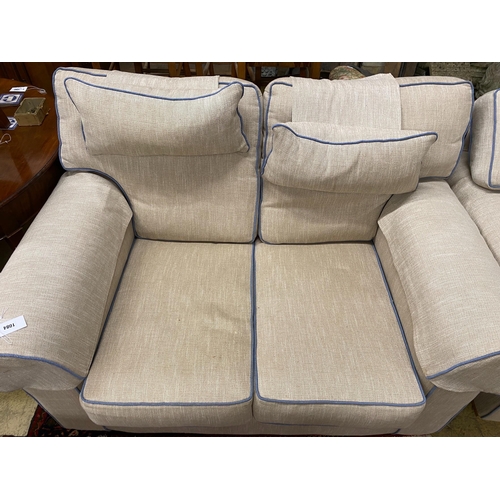 1084 - Two cream upholstered settees, with blue corded edging, larger length 200cm, depth 100cm, height 97c... 