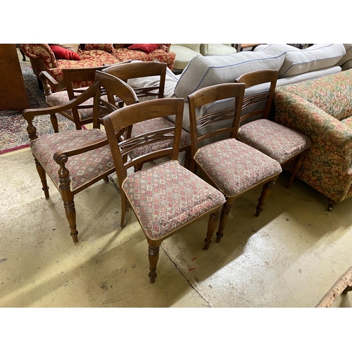 1086 - A set of six Indonesian hardwood dining chairs, two with arms