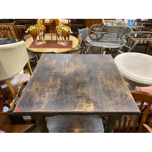 1096 - A pair of square stained pine tavern tables, width 65cm, height 75cm