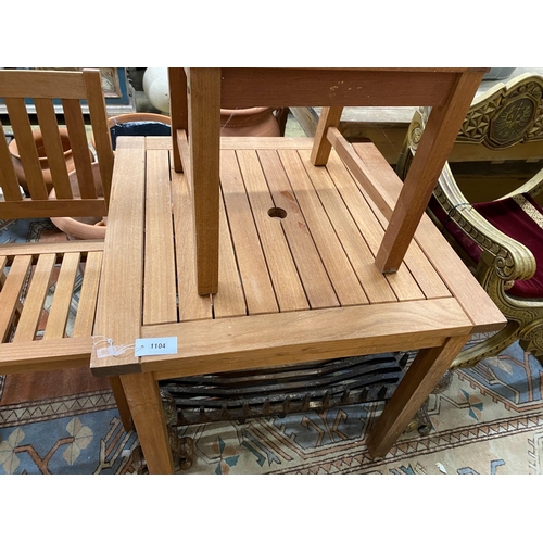 1104 - A square teak garden table, width 80cm, height 73cm together with two teak garden chairs