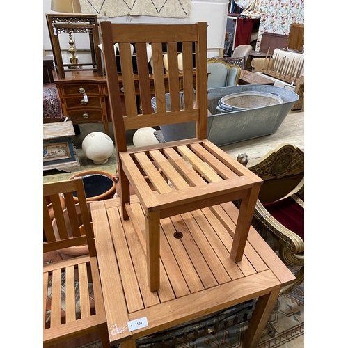 1104 - A square teak garden table, width 80cm, height 73cm together with two teak garden chairs