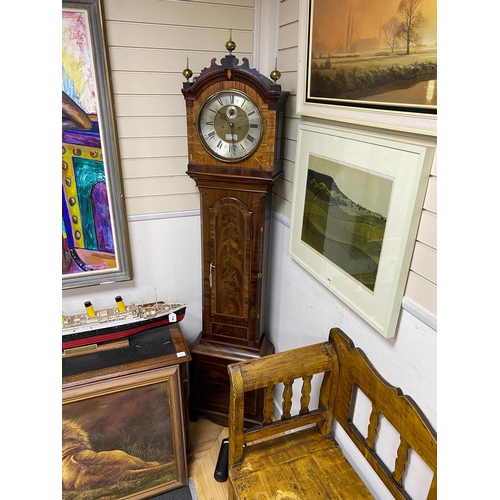 1147 - A 19th century flamed mahogany cased 8 day longcase clock, with silver chapter ring and subsidiary d... 