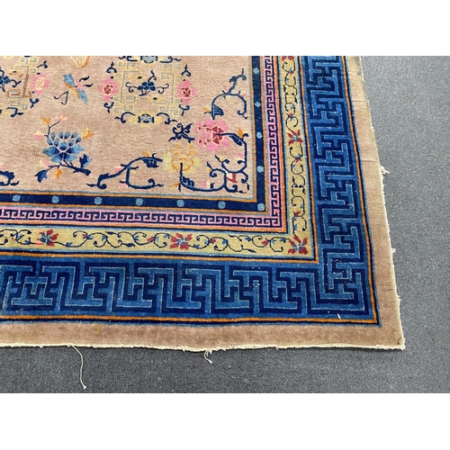 1161 - An early 20th century Chinese lilac ground carpet, 330 x 240cm