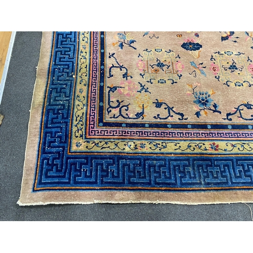 1161 - An early 20th century Chinese lilac ground carpet, 330 x 240cm