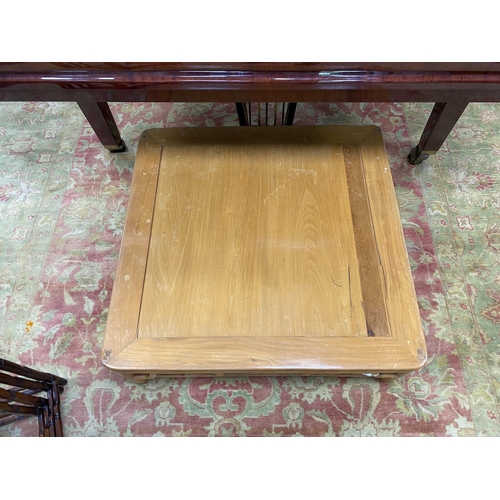 1173 - A Chinese square elm low table, length 88cm, height 28cm